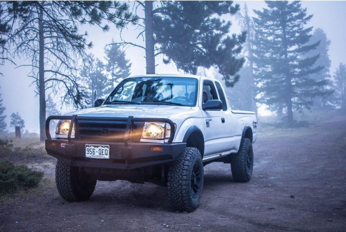A truck that is driving down the road protected by one of Red Shield Administrations plans.