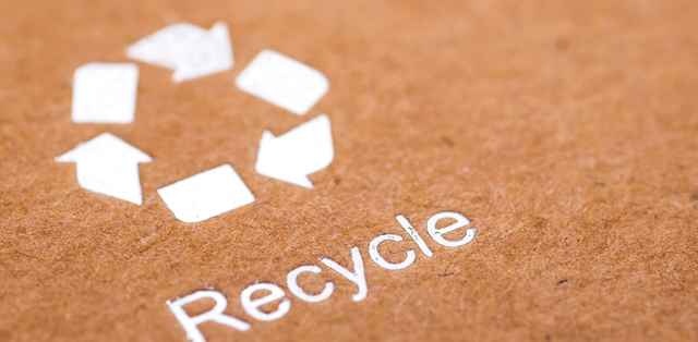 Three white arrows create a circle facing towards the end of the other arrow. Underneath the arrows appears the word "recycle."